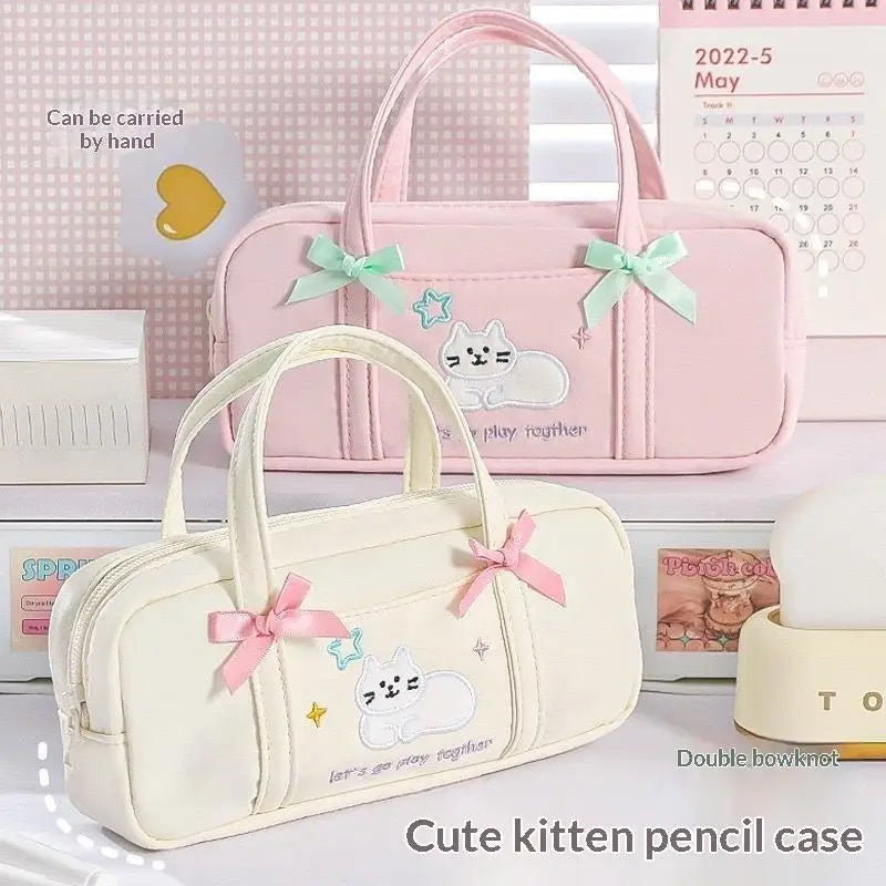 Bow Kitten Mini Tote Pencil Case: Mini tote pencil pouch showing its carry handles 03