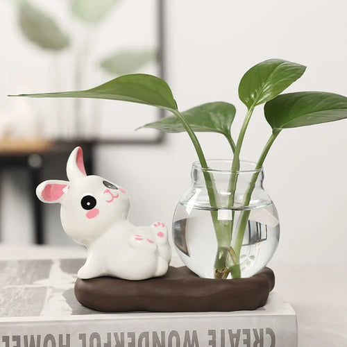 Bunny Glass Bud Vase: 07 sidelying white bunny with pink paws beside a leafy bud