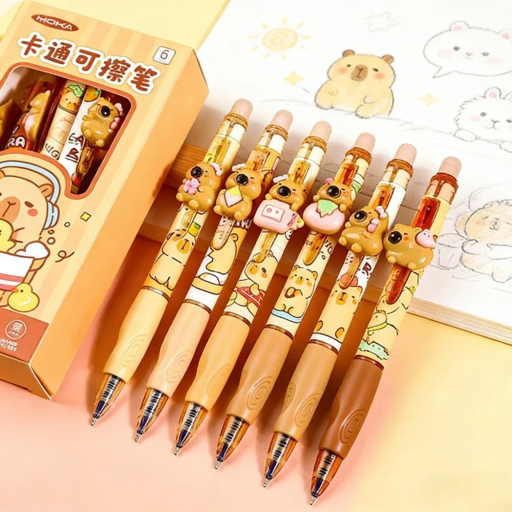 Capybara Erasable Gel Pen Set: 01 six brown capybara erasable gel pens arranged beside their box