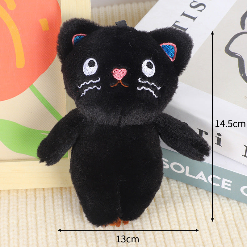 Black cat plush bag charm with polka dot details