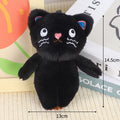 Black cat plush bag charm with polka dot details