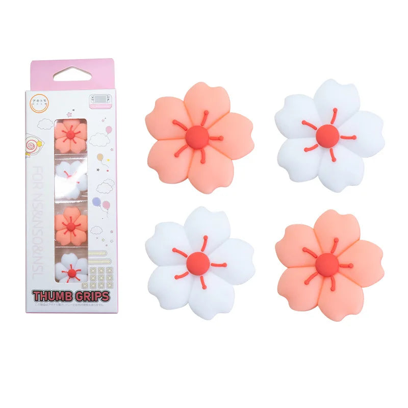Sakura Flower Switch Thumb Grip Caps: Fourpiece pink and white sakura thumb grip pack with retail box