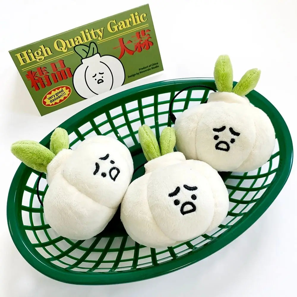 Grumpy Garlic Plush Keychain: Garlic plush charms beside a garlic themed display card 03