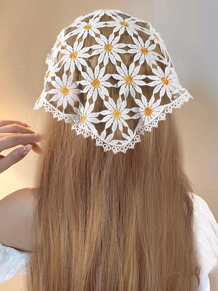 Yellow-centre daisy triangle headscarf styled for wear