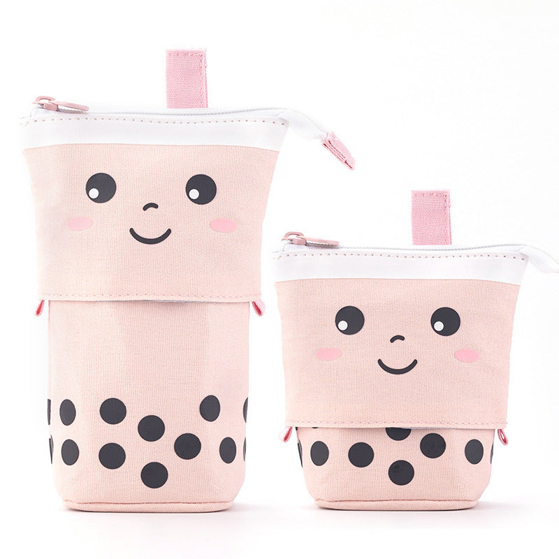 One pink smiling pencil case shown in its raised and lowered positions