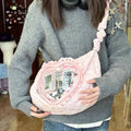 Quilted Heart Window Ita Hobo Bag: 02 pink lace edged heart ita bag carried with a