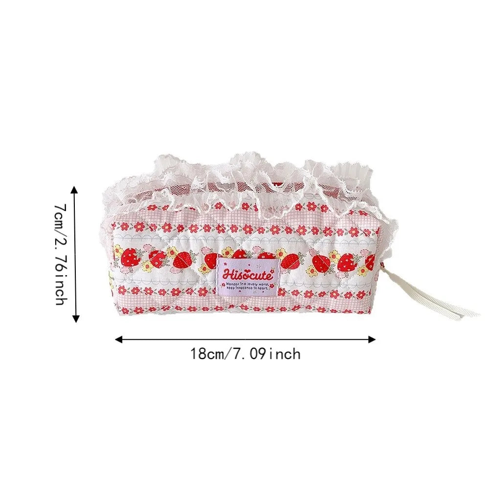 Quilted Ruffle Pencil Case: A strawberry print pencil case is isolated on white with measurement arrows the 5