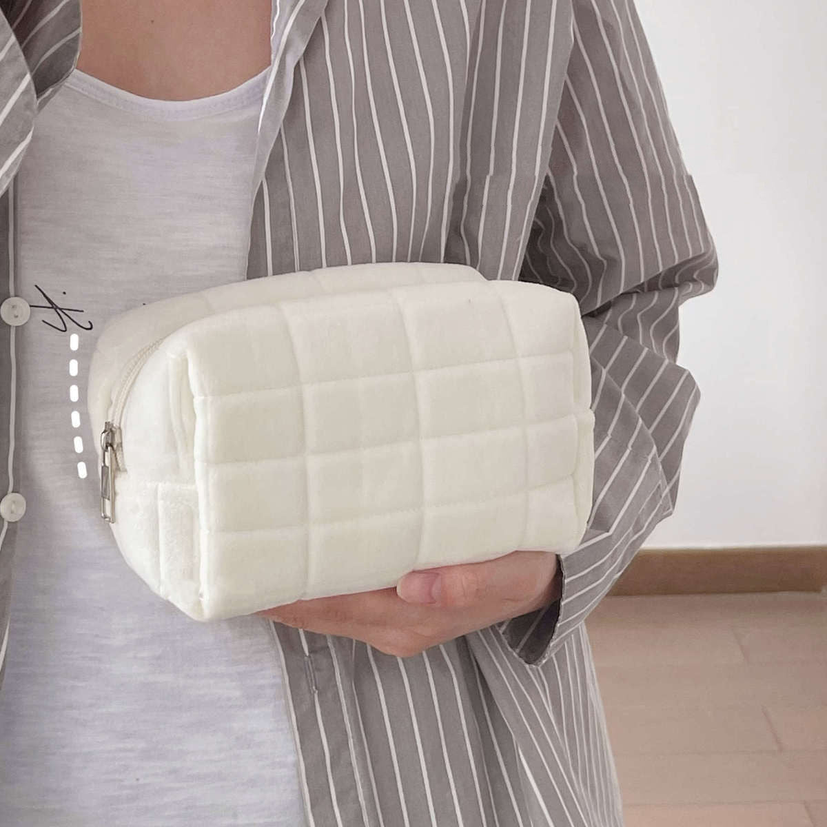Cream quilted makeup bag with zip